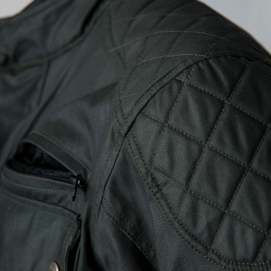 Stylish black waxed cotton motorcycle jacket with weatherproof finish and classic design